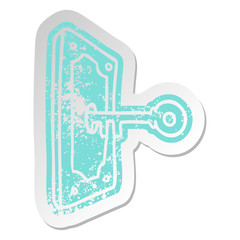 distressed old sticker of a door handle