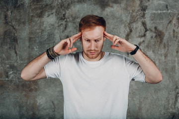 Young male portrait in white shirt