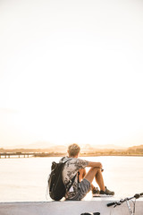 man in sunset on beach