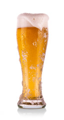 Glass of light beer on a white background