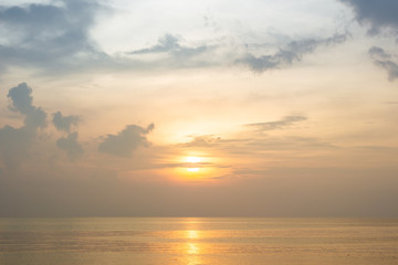 Naklejka na ściany i meble Beautiful sunrise from the sea with beautiful cloud background.