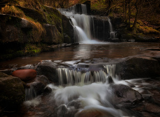 Fototapeta premium A Blaen y Glyn cascade A series of closely connected waterfalls at Blaen y Glyn, near Merthyr Tydfil in the South Wales valleys, UK