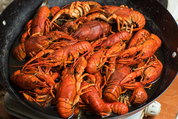 boiled crayfish on an iron plate.