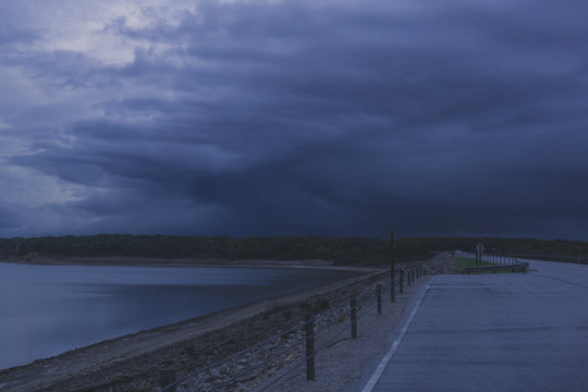 A storm brews over Saylorville Lake Dam in Johnston, Iowa
