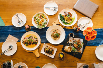 Top view of Thai food meal set on wood table