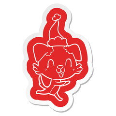 laughing cartoon  sticker of a dog wearing santa hat