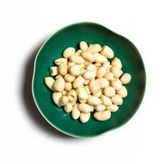 Peanut in a bowl isolated on white background.