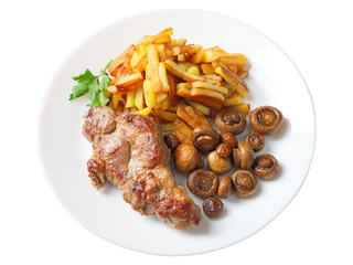 steak with fried potatoes and mushrooms isolated
