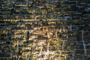 Dramatically Lit Stone Water Fountain