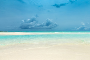  Maldives island with white sandy beach and sea