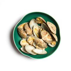 Clam in a bowl isolated on white