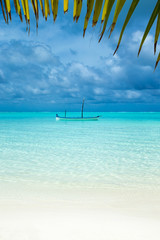 Maldives island with white sandy beach and sea