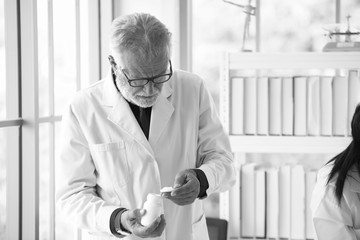 Scientists are working on scientific tests in the lab.Scientists are working on scientific tests in...