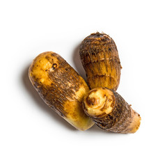 Overhead view of taro isolated on white background.
