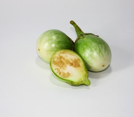 Round eggplant on white background