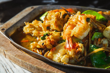 Thai food sea food stir fry with herb and spice