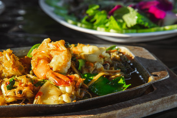 Thai food sea food stir fry with herb and spice