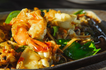 Thai food sea food stir fry with herb and spice