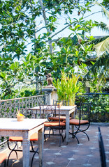 Tables in the open-air terrace restaurant