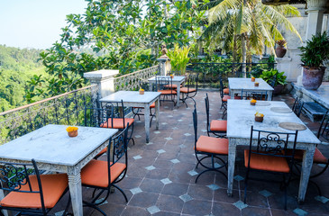 Tables in the open-air terrace restaurant