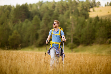 Active healthy man hiking at nature