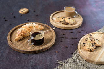 cup of espresso and chocolate chip cookies