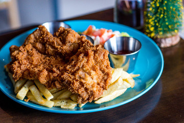 Chicken Chop Garlic Soy Sauce with french fries and coleslaw