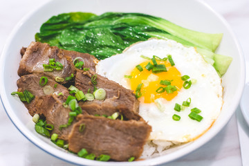 Porky Bowl Homemade char siu with rice and sunny side up & siew pak choy
