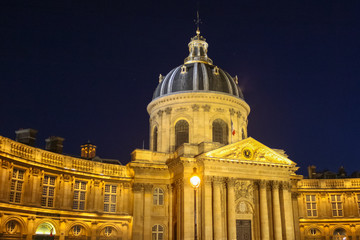 Fototapeta na wymiar The building of the Institute of France at night