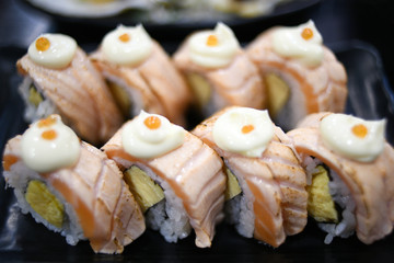 Sushi Roll with salmon burn