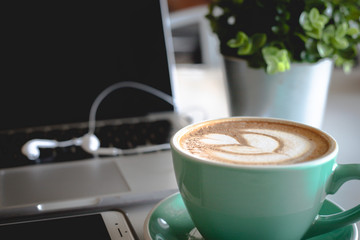 cup of coffee and laptop