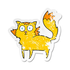 retro distressed sticker of a cartoon cat