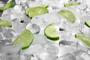 Fresh lime slices on pile of ice cubes