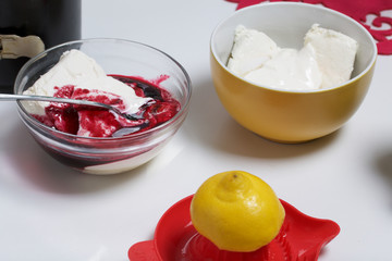 Blueberry cheesecake. Ingredients for cooking are located on the surface of the table.