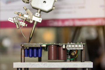 robot system for automated manufacturing soldering and assembly printed electronic circuit board