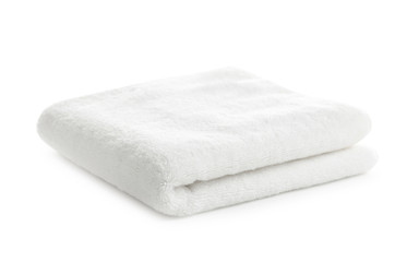 Fototapeta na wymiar Folded clean soft towel on white background