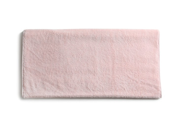 Fototapeta na wymiar Folded soft terry towel on white background, top view