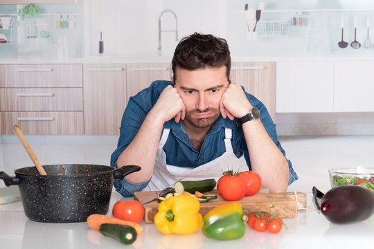 Sad And Frustrated Man With Kitchen Fails