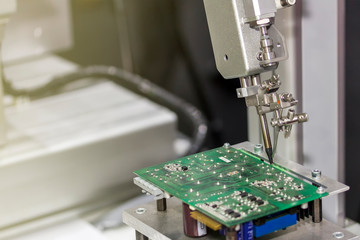 robotic system for automatic point soldering for printed and assembly electric circuit board ( PCB )  at factory