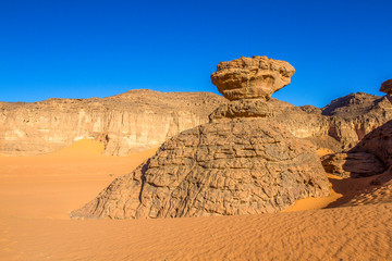 Fototapeta na wymiar Sahara’s landscape. Amazing rock formation in Tadrart Rouge. Sahara desert. Tassili n’Ajjer National Park, Algeria 