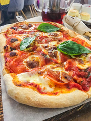 Italian pizza on a wooden Board