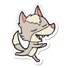 sticker of a cartoon wolf laughing