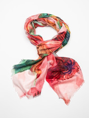Multicolor scarf on white background. Top view.