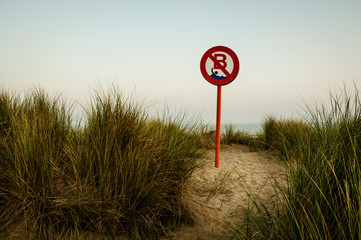 Beach sign forbids swimming