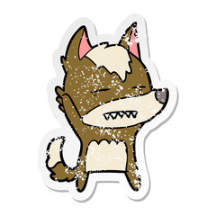 distressed sticker of a cartoon wolf waving showing teeth