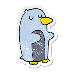distressed sticker of a cartoon penguin