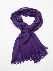 Violet scarf on white background. Top view.