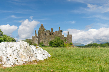 Fototapeta na wymiar Kilchurn Castle in Scotland on sunny summer day