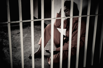 Hands of women desperate to catch the iron prison,prisoner concept,thailand people,Hope to be free.