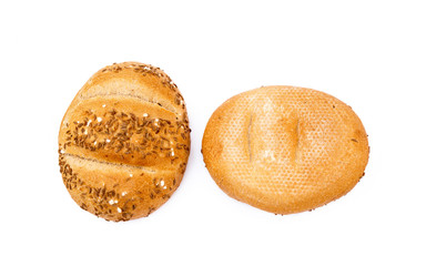 Crispy bun sprinkled with caraway isolated on white background